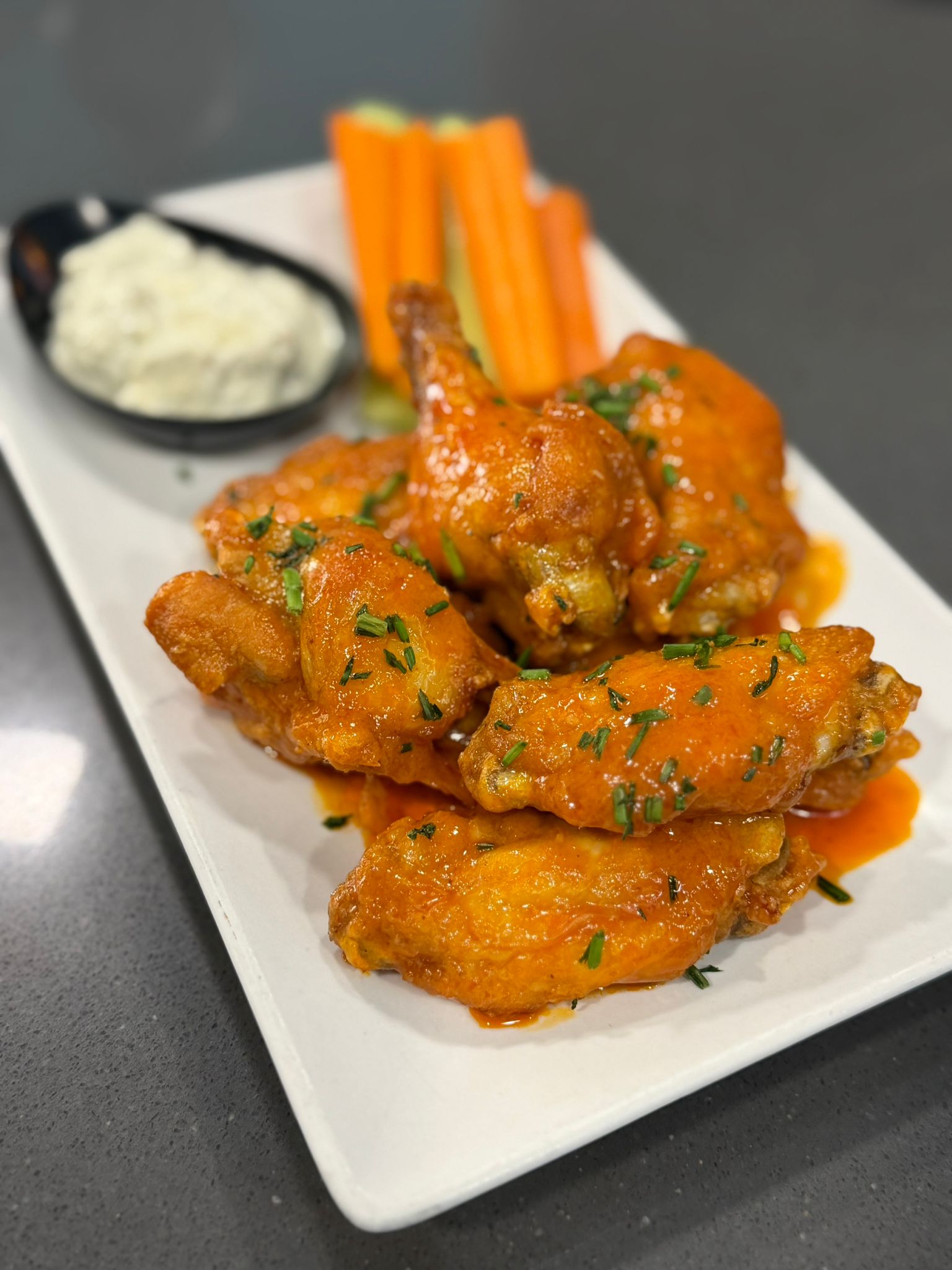 Buffalo chicken wings with blue cheese